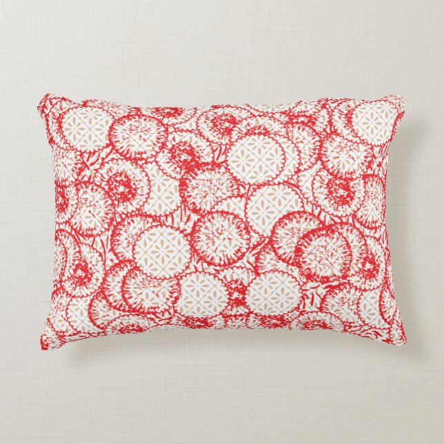 Intricate textile design featuring red, gold, and  decorative cushion (Front)