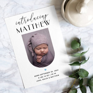 Introducing. Black and white elegant script birth Announcement