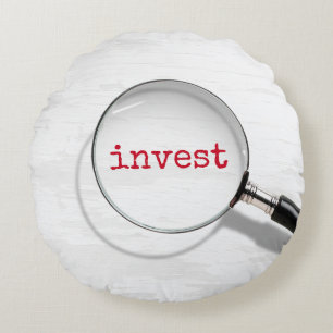 Invest Text Under Magnifying Glass Round Cushion
