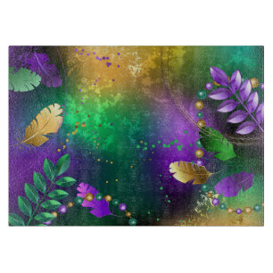 Iridescent mardi gras background with beads cutting board