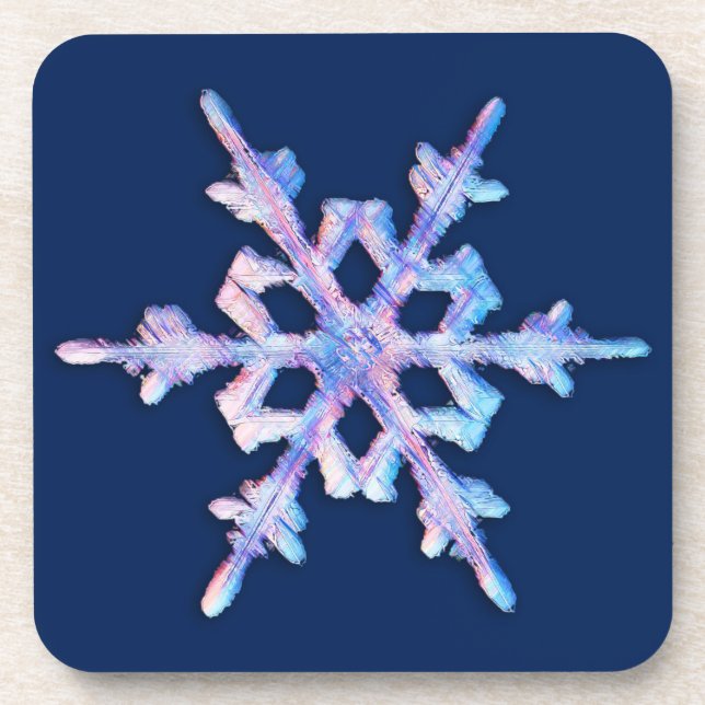 Iridescent snowflake on dark blue coaster (Front)