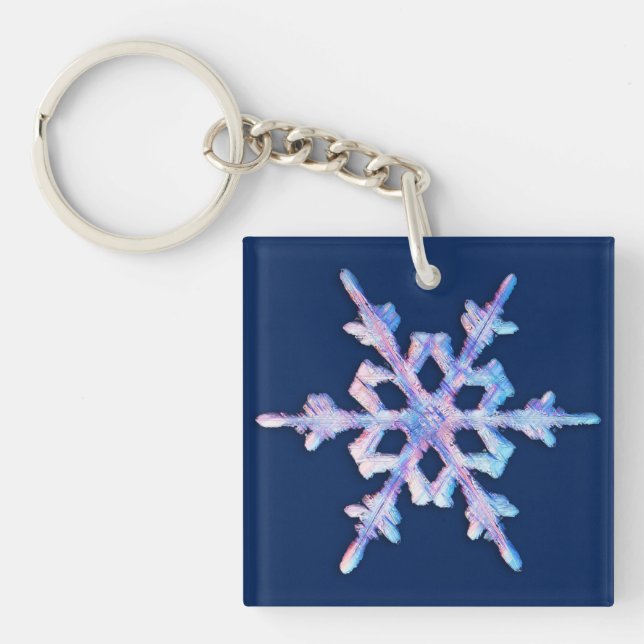 Iridescent snowflake on dark blue key ring (Front)