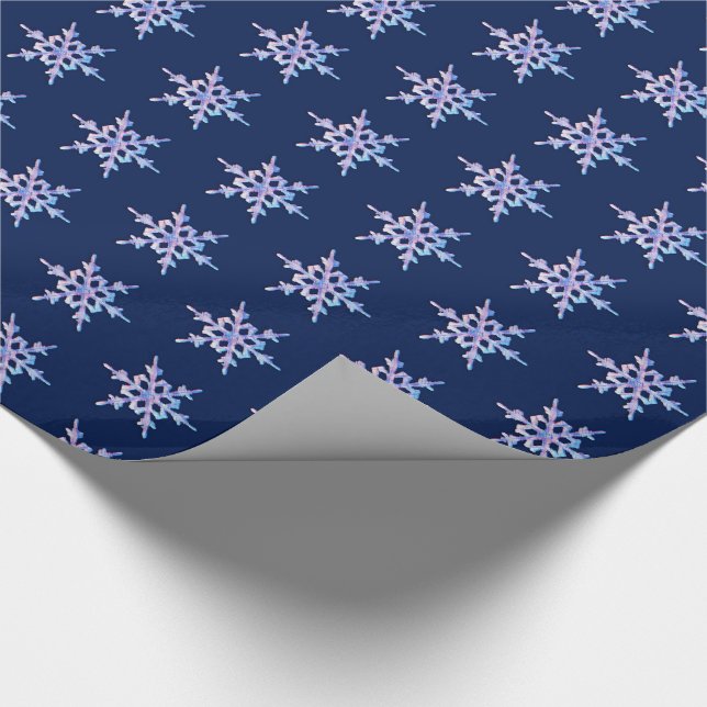 Iridescent snowflake on dark blue wrapping paper (Corner)