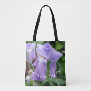 Iris after the rain. Text. Tote Bag