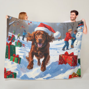 Irish Red Setter Running Snow with Christmas Hat Fleece Blanket