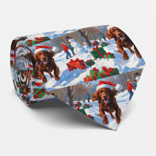 Irish Red Setter Running Snow with Christmas Hat Tie