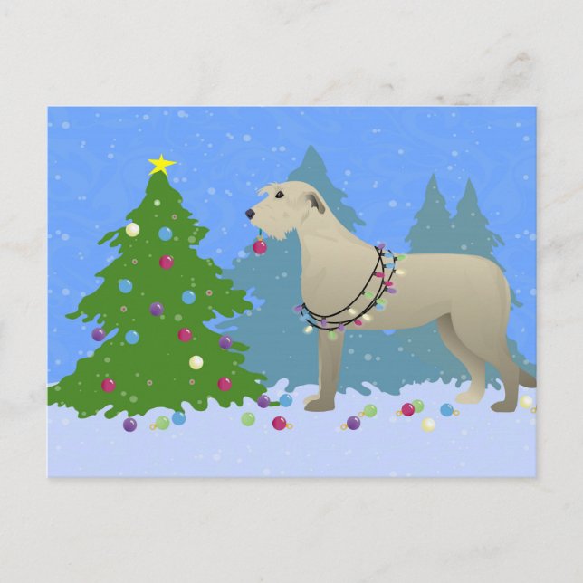 Irish Wolfhound decorating a Christmas tree-forest Holiday Postcard (Front)