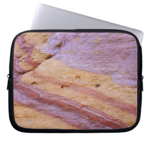 Iron oxides color a sandstone formation laptop sleeve