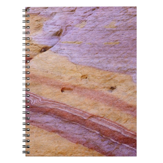 Iron oxides color a sandstone formation notebook (Front)