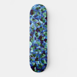 Irregular and disorganised mosaic overlaid blue skateboard