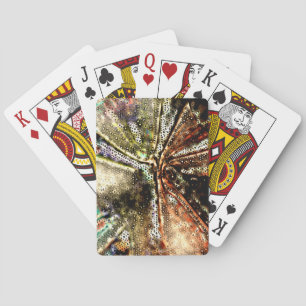 Irregular mosaic over wrinkled and moldy fabric playing cards