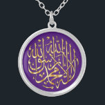 Islamic Silverplate Necklace w/Gold Muslim Shahada<br><div class="desc">Elegant silver plated round charm-style necklace printed with the Islamic shahada in golden calligraphy on a purple background for Muslim girls and women. Please check my store for a wide variety of Muslim products and gift ideas,  insha'Allah. Barak Allah Fikum and Jazakum Allah Khair!</div>