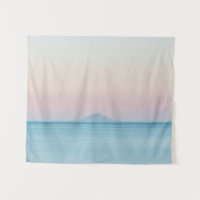 Island silhouette on horizon at sunset