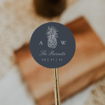 Island Vintage Pineapple Wedding Monogram Classic Round Sticker<br><div class="desc">A perfect match for summer, tropical, Hawaii or southern weddings, our island chic wedding design features a vintage style pineapple illustration with your names and wedding date in elegant ecru lettering on a smoky navy blue background. Add your initials on either side of the pineapple. Coordinates with our Island Vintage...</div>