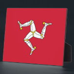 Isle of Man Flag Plaque<br><div class="desc">Add a touch of Isle of Man pride to your décor with our exclusive plaque featuring the flag of the Isle of Man! Crafted with meticulous attention to detail, this plaque is more than just a decorative item; it’s a celebration of the Isle of Man’s heritage. The elegant design prominently...</div>