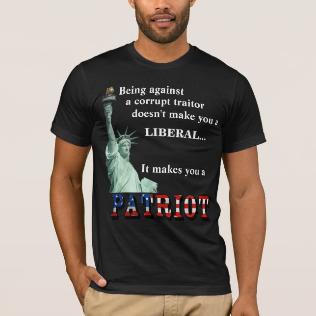 It makes you a PATRIOT T-Shirt (Front)