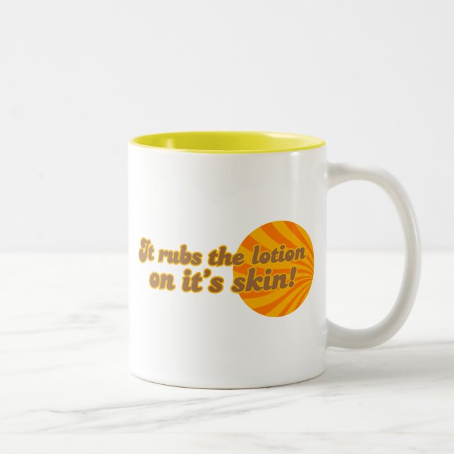 It puts the lotion on its skin Two-Tone coffee mug (Right)