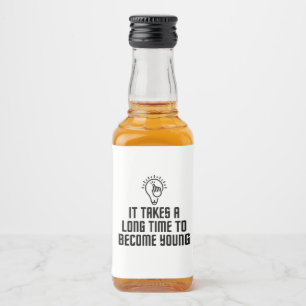 It takes a long time to become young liquor bottle label