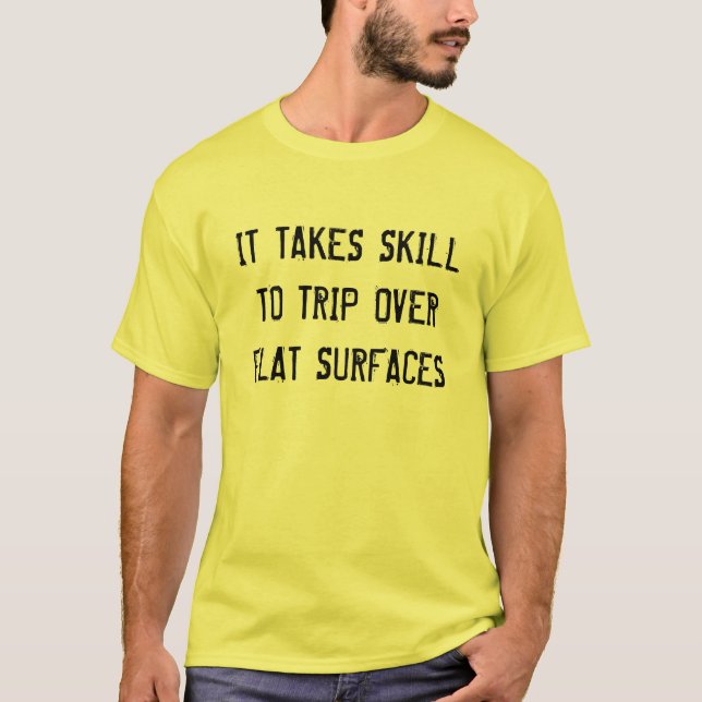 IT TAKES SKILL TO TRIP OVER FLAT SURFACES T-Shirt (Front)