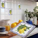 Italian Lemons Blue Filigree European Tile<br><div class="desc">Introducing our delightful European-inspired ceramic tiles, available in two dimensions: 4.25x4.25 inches and 6x6 inches. These exquisite tiles feature vibrant lemon motifs nestled amidst abundant, verdant foliage, elegantly encircled by an opulent navy blue toile filigree border. Embark on a journey to the picturesque landscapes of Italy or the charming French...</div>