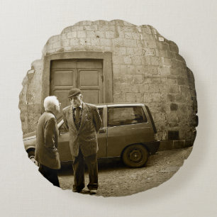 Italian street scene in sepia round throw pillow
