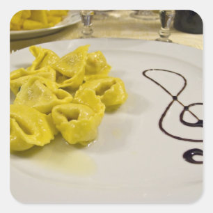 Italy, Cento. A plate of cheese tortellini Square Sticker