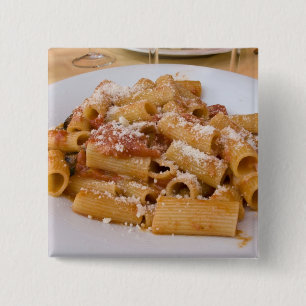 Italy, Positano. Display plate of rigatoni. 15 Cm Square Badge