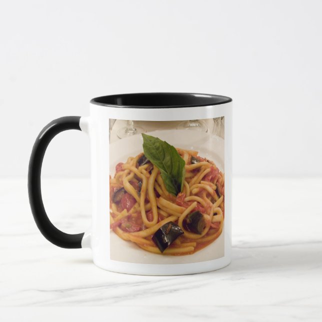 Italy, Positano. Plate of pasta and eggplant. Mug (Left)