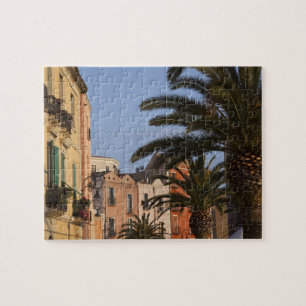 Italy, Sardinia, Cagliari. Buildings and palms Jigsaw Puzzle
