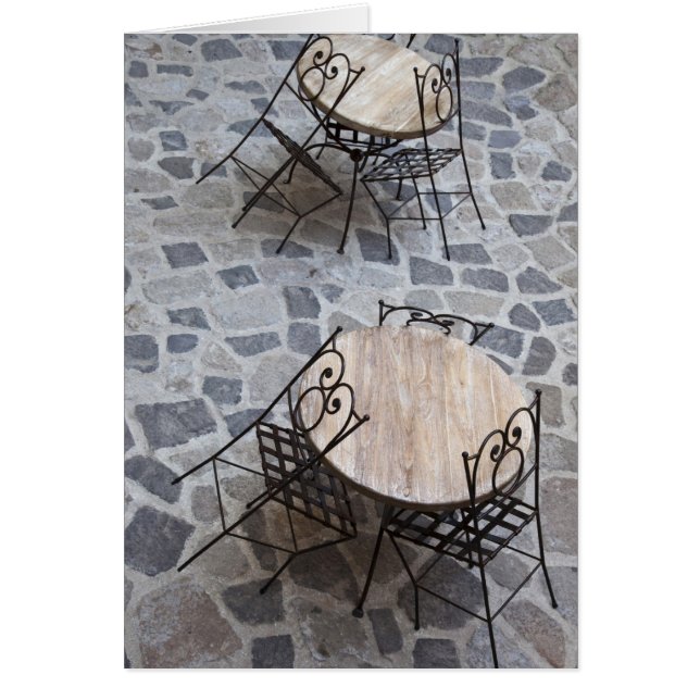 Italy, Sardinia, Castelsardo. Cafe tables. (Front)