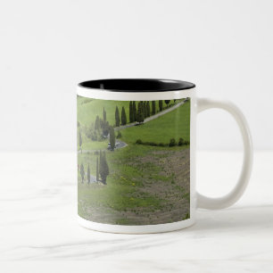 Italy, Tuscany. La Foce. A curved road winds up Two-Tone Coffee Mug