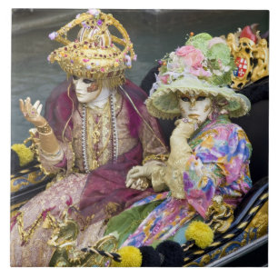 Italy, Venice. Couple dressed in costumes for Tile