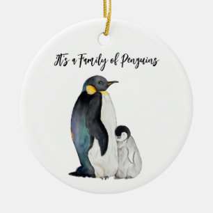 It's a family of penguins watercolor drawing ceramic tree decoration