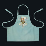 It's a Festivus Miracle Apron<br><div class="desc">Gather 'round the aluminum pole and celebrate the most unexpected moments of the season with this "It's a Festivus Miracle!" graphic. Featuring the legendary Frank Costanza in his peak holiday form, this design captures the hilarious energy of the Seinfeld holiday we all know and love. With its retro sunburst background...</div>