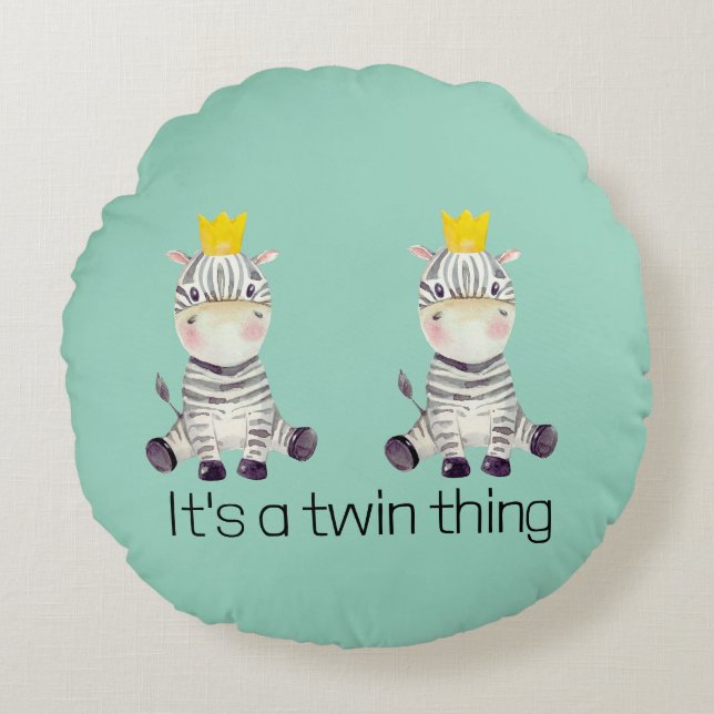 It's a twin thing nursery round cushion (Front)