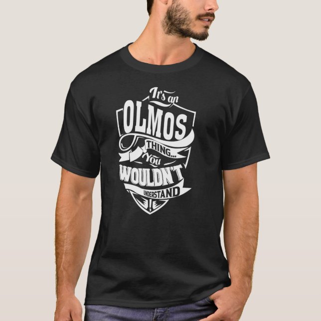 It's an OLMOS Thing T-Shirt (Front)