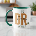 It's Dr Actually, Custom Doctor PhD Graduation Mug<br><div class="desc">The "It's Doctor Actually Personalised Mug" is a witty and charming tribute to the medical profession. With a playful play on words, this mug features a stylish design that spells out "DR." in a modern and cute font. The customisable touch allows for the addition of a name, making it a...</div>