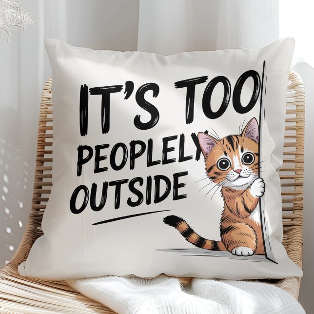 "It's Too Peopely Outside" Funny Introvert Cat Cushion ("It's Too Peopely Outside" Funny Introvert Cat Throw Pillow in a sunny boho rattan chair.)