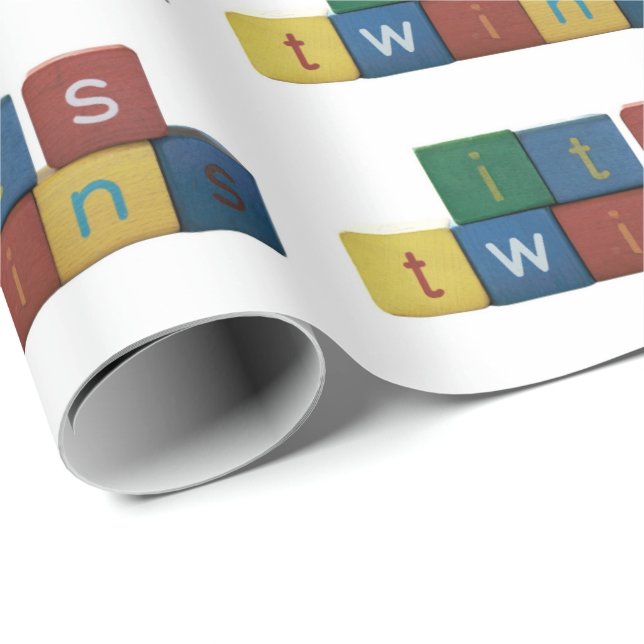 It's twins in children's block letters wrapping paper (Roll Corner)
