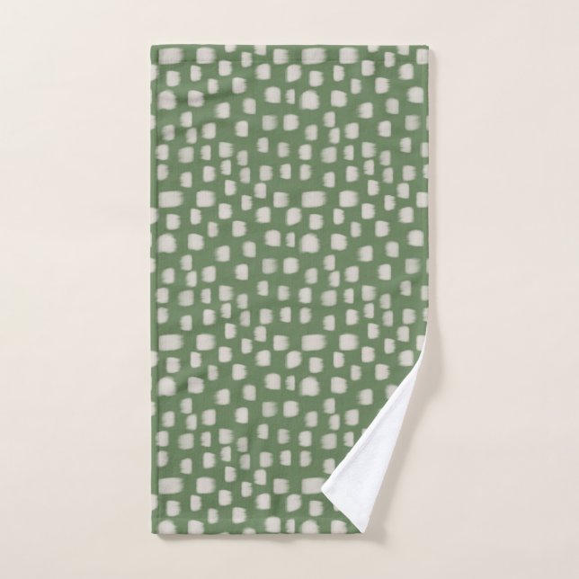 Ivory brush strokes on green hand towel  (Hand Towel)