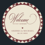 Ivory & Burgundy Checkered Retro Wedding Welcome Classic Round Sticker<br><div class="desc">This Ivory & Burgundy checkered retro welcome sticker features a warm deep burgundy and cream checker pattern with elegant contemporary typography and subtle vintage character. The playful-retro styling creates a refined old-money fall / winter mood, making it a charming detail for welcome bags, favors, envelopes, or stationery accents. Designed to...</div>