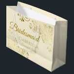 Ivory Cream & Gold Lace Elegant Bridesmaid Large Gift Bag<br><div class="desc">This beautiful gift bag is designed as a wedding gift or favour bag for Bridesmaids. It features an elegant ivory cream and gold design with golden lace frills in the corners the text "Bridesmaid" as well as a place to enter her name, the couple's name, and the wedding date. Fill...</div>