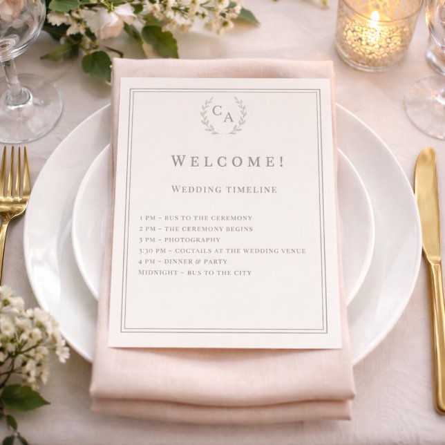 Ivory monogrammed wedding program flyer (Creator Uploaded)