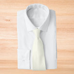 Ivory Solid Color Tie<br><div class="desc">Ivory Solid Color. This soft,  off-white hue radiates elegance and sophistication,  making it perfect for any occasion that calls for a touch of refined beauty. Its subtle warmth and creamy undertones create a versatile shade suitable for all occasions.</div>