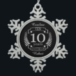 Ivory Traditional wedding anniversary 10 years Snowflake Pewter Christmas Ornament<br><div class="desc">A design to celebrate 10 years of marriage. This design has a Grey / silver (the traditional colour for this anniversary) coloured laurel design on a black background. Tin is the traditional gift for this occasion. The text reads Tin 10 years anniversary. A romantic design to celebrate your 10th year...</div>