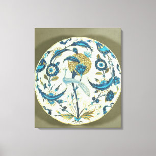 Iznik dish painted with a peacock perched among fl canvas print