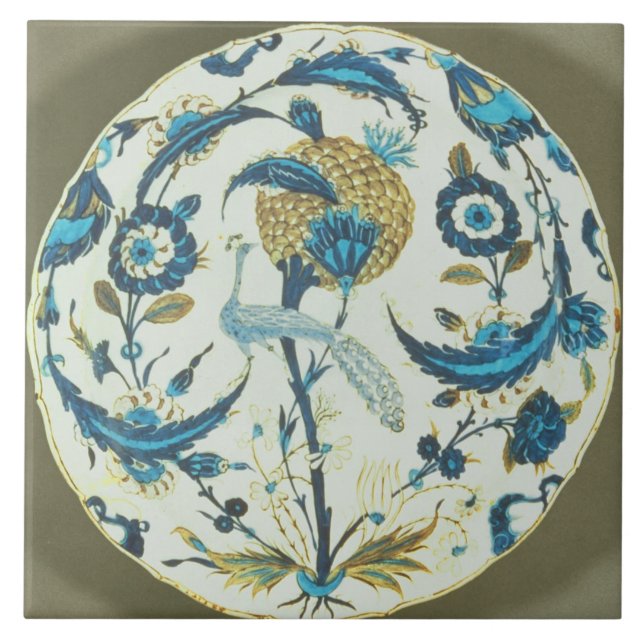 Iznik dish painted with a peacock perched among fl tile (Front)