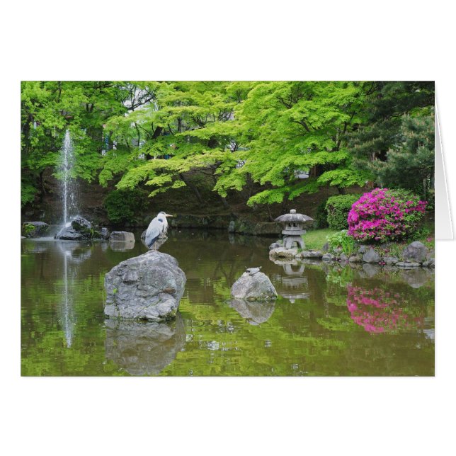 Japan, Kyoto. Heron in fresh green leaves (Front Horizontal)