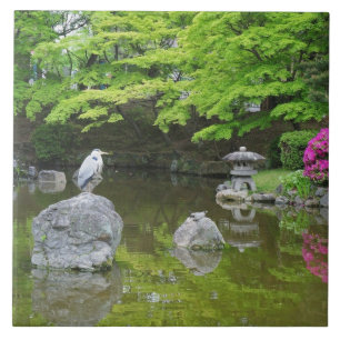 Japan, Kyoto. Heron in fresh green leaves Tile