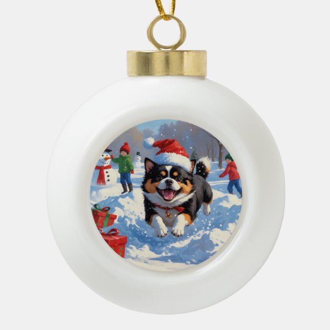 Japanese Chin Running in Snow with Christmas Hat Ceramic Ball Christmas Ornament (Front)